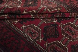 Full view of 2000s Baloch rug from Iran / Persia, 307 × 153 cm in Red tones