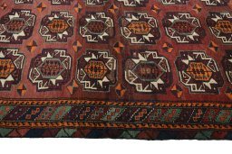 Close-up detail of 2000s Baloch rug from Iran / Persia showing Wool weave