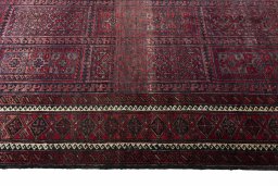 Close-up detail of 2000s Baloch rug from Iran / Persia showing Wool weave