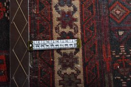 Close-up detail of 2000s Baloch rug from Iran / Persia showing Wool weave