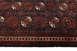 Close-up detail of 2000s Baloch rug from Iran / Persia showing Wool weave