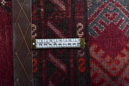 Close-up detail of 2000s Baloch rug from Iran / Persia showing Wool weave