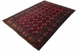 Corner detail of 2000s Baloch rug showing border pattern and Wool pile
