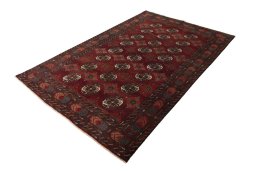Corner detail of 2000s Baloch rug showing border pattern and Wool pile