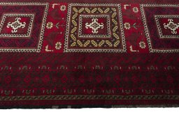 Close-up detail of 2000s Baloch rug from Iran / Persia showing Wool weave