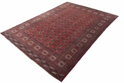 Corner detail of 2000s Baloch rug showing border pattern and Wool pile