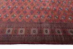 Close-up detail of 2000s Baloch rug from Iran / Persia showing Wool weave