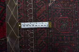 Close-up detail of 2000s Baloch rug from Iran / Persia showing Wool weave