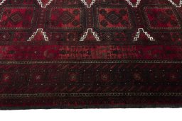Close-up detail of 2000s Baloch rug from Iran / Persia showing Wool weave