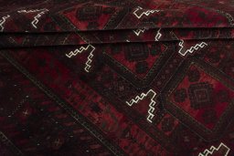 Full view of 2000s Baloch rug from Iran / Persia, 300 × 191 cm in Red tones