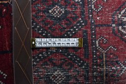 Close-up detail of 2000s Baloch rug from Iran / Persia showing Wool weave