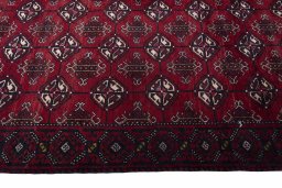 Close-up detail of 2000s Baloch rug from Iran / Persia showing Wool weave