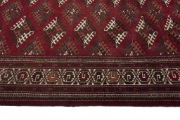 Close-up detail of 1970s Baloch rug from Iran / Persia showing Wool weave