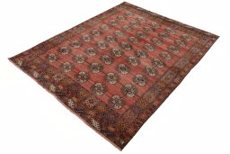 Corner detail of 1970s Baloch rug showing border pattern and Wool pile