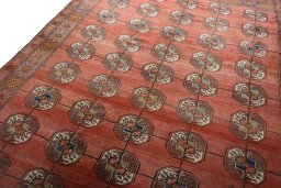 Backside of handmade 1970s Baloch rug showing knot structure and weave density