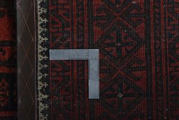 Close-up detail of 2000s Baloch rug from Iran / Persia showing Wool weave