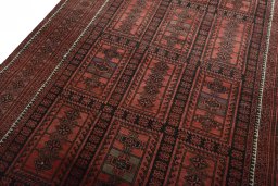 Backside of handmade 2000s Baloch rug showing knot structure and weave density