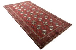 Close-up detail of 2000s Baloch rug from Iran / Persia showing Wool weave
