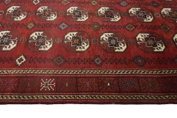 Close-up detail of 2000s Baloch rug from Iran / Persia showing Wool weave