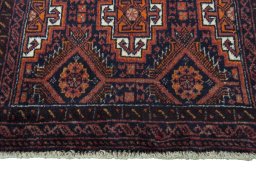 Central medallion detail of 2000s Baloch rug from Iran / Persia