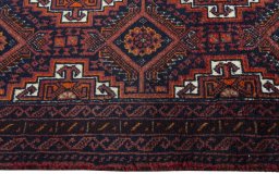 Close-up detail of 2000s Baloch rug from Iran / Persia showing Wool weave