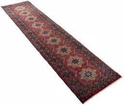 Close-up detail of 2000s Baloch rug from Iran / Persia showing Wool weave