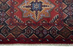 Central medallion detail of 2000s Baloch rug from Iran / Persia