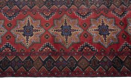 Close-up detail of 2000s Baloch rug from Iran / Persia showing Wool weave
