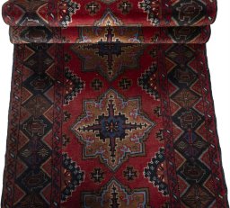 Full view of 2000s Baloch rug from Iran / Persia, 310 × 72 cm in Red tones