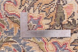 Corner detail of 1988s Baloch rug showing border pattern and Wool pile
