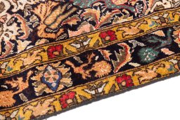Backside of handmade 1988s Baloch rug showing knot structure and weave density