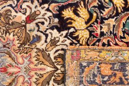 Close-up detail of 1988s Baloch rug from Iran / Persia showing Wool weave