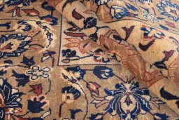 Corner detail of 1980s Baloch rug showing border pattern and Wool pile