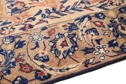Backside of handmade 1980s Baloch rug showing knot structure and weave density