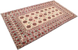 Corner detail of 1990s Baloch rug showing border pattern and Wool pile