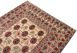 Surface texture of 1990s Baloch rug with natural Wool and intricate pattern