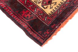 Central medallion detail of 1970s Baloch rug from Iran / Persia