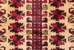 Full view of 1970s Baloch rug from Iran / Persia, 128 × 100 cm in Cream tones