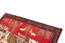 Surface texture of 1970s Baloch rug with natural Wool and intricate pattern