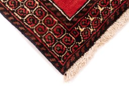 Central medallion detail of 1970s Baloch rug from Iran / Persia