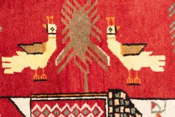 Corner detail of 1970s Baloch rug showing border pattern and Wool pile