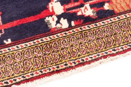 Backside of handmade 1998s Baloch rug showing knot structure and weave density