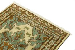 Surface texture of 2000s Baloch rug with natural Wool and intricate pattern
