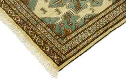 Backside of handmade 2000s Baloch rug showing knot structure and weave density