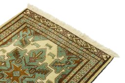Surface texture of 2000s Baloch rug with natural Wool and intricate pattern