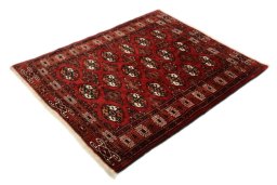 Corner detail of New Baloch rug showing border pattern and Wool pile