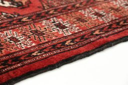 Central medallion detail of New Baloch rug from Iran / Persia