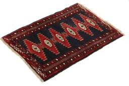 Close-up detail of 1990s Baloch rug from Iran / Persia showing Wool weave