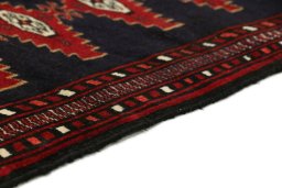 Central medallion detail of 1990s Baloch rug from Iran / Persia