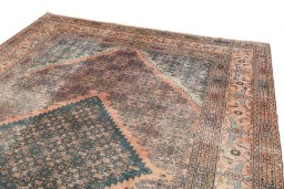 Surface texture of 1900s Dorokhsh rug with natural Wool and intricate pattern